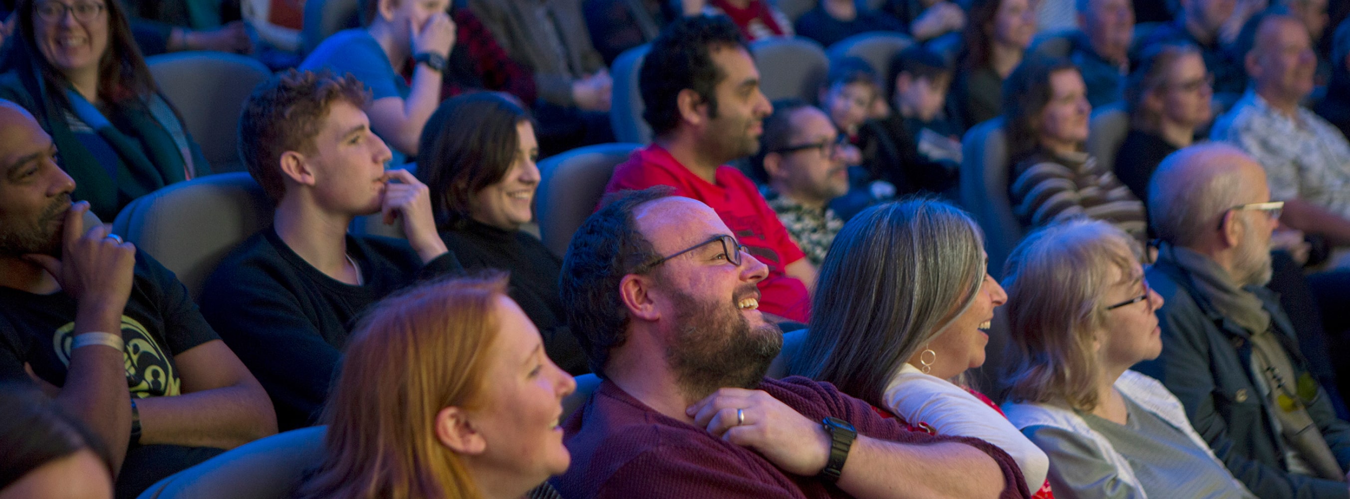 A laughing crowd at a British Library event