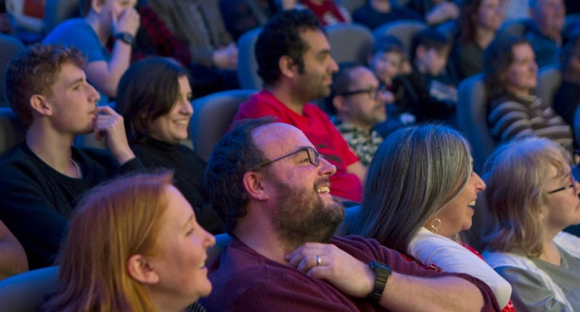 A laughing crowd at a British Library event