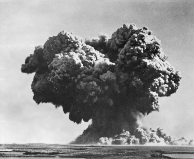 A large black cloud bellows out from the blast of Operation Hurricane.