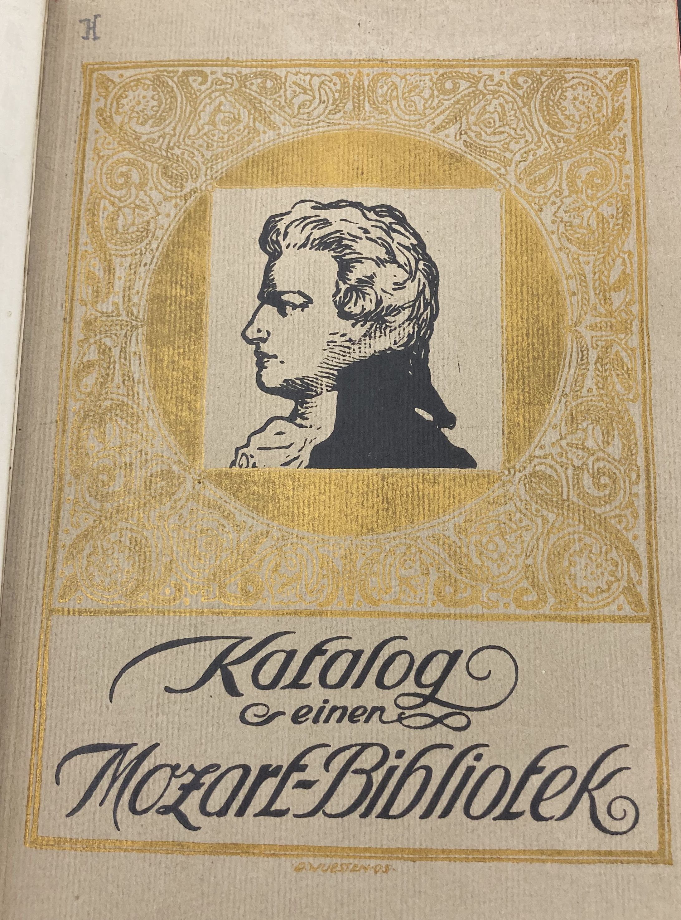 Cover of Paul Hirsch's Katalog einer Mozart-Bibliothek featuring a profile of Mozart.
