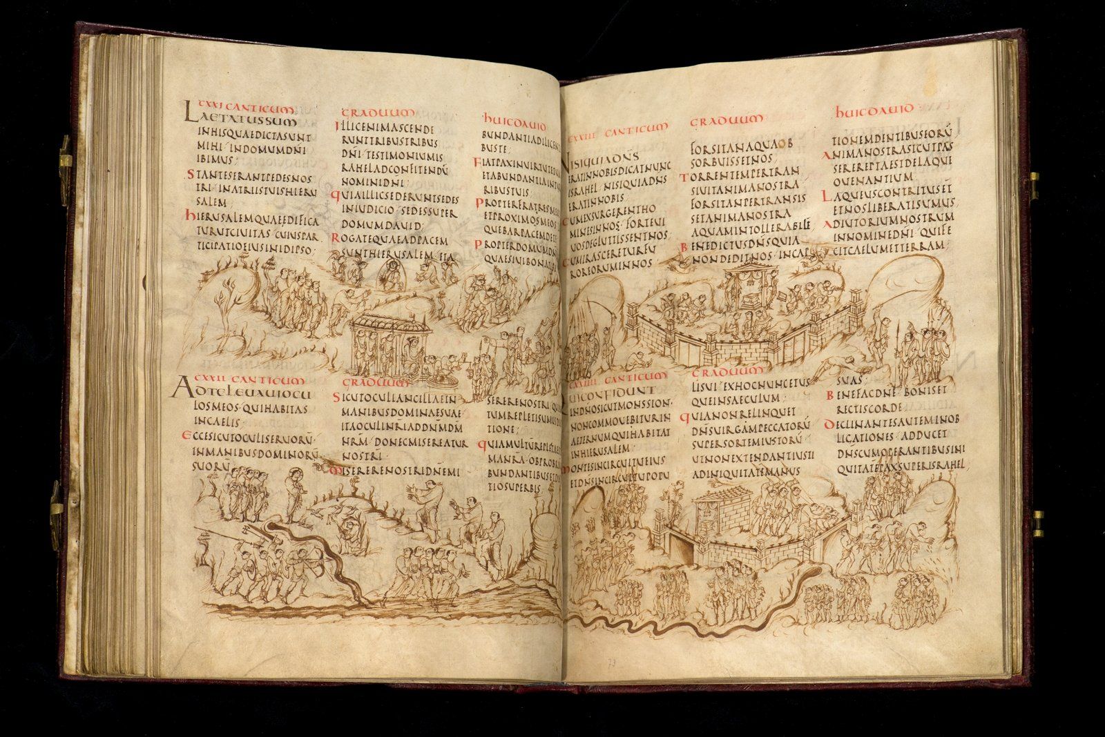 An opening from a medieval manuscript, showing the text of the Psalms, with accompanying hand-drawn illustrations.