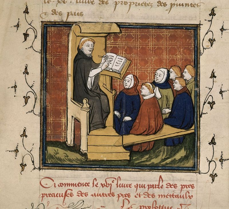 A detail from a 15th-century manuscript, showing a scribe with a group of pupils.
