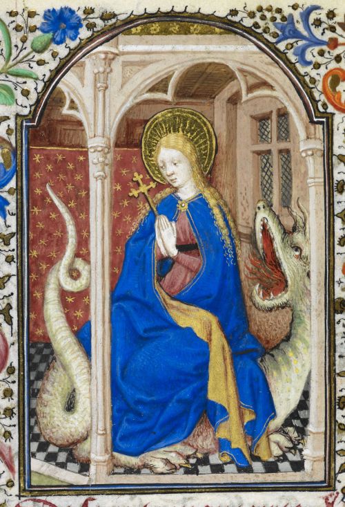 Women in blue dress is standing on a green dragon, her hands are pressed together in prayer, she holds a crucifix