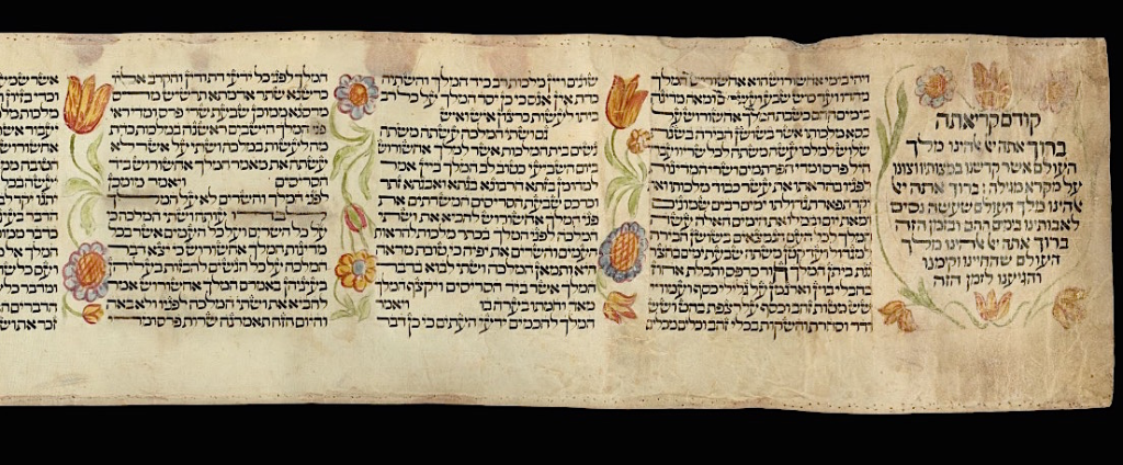Esther Scroll with floral decorations.