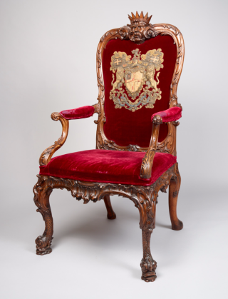 Director's chair with the East India Company arms embroidered on the crimson velvet, c. 1730. British Library, Foster 905
