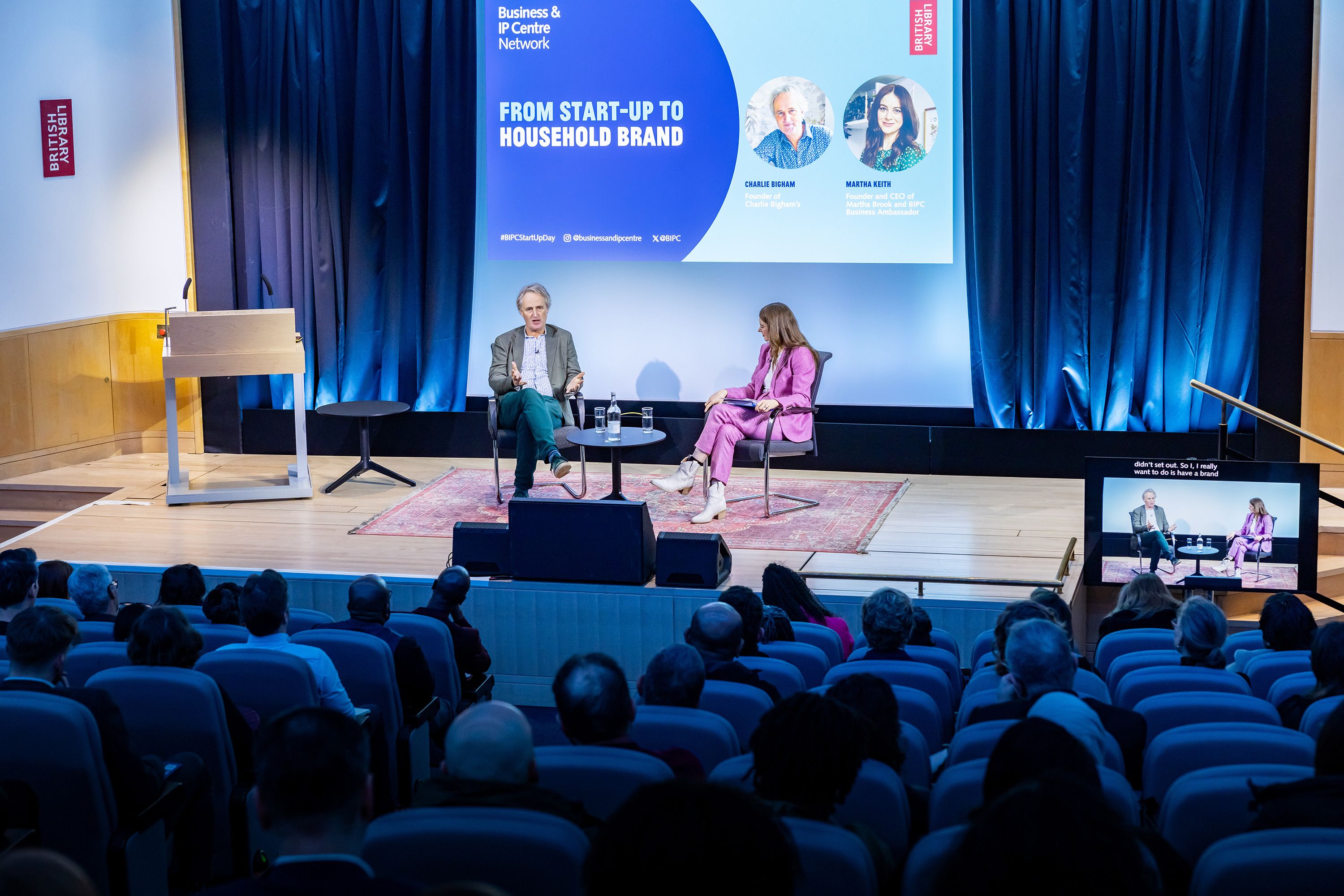 Charlie Bigham talking on stage.