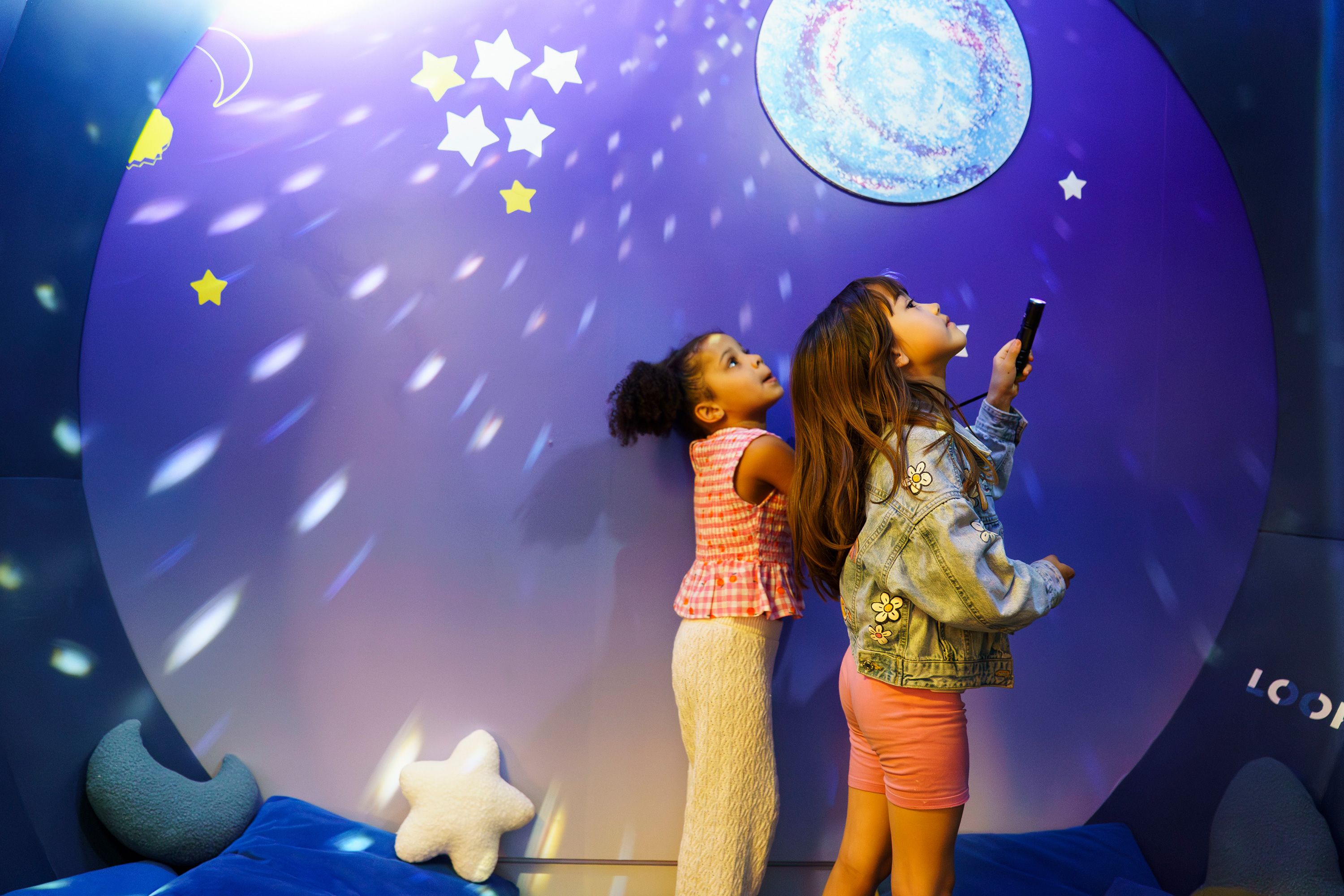 Two girls at an exhibition.