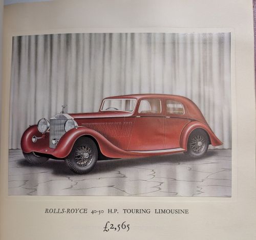 An advertisement for Rolls-Royce Phantom III car. Showing an illustration of a red car. Published in 1936.