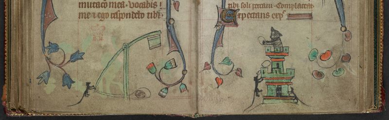 An opening from a Book of Hours, featuring a marginal illustration of mice besieging a cat in a castle.