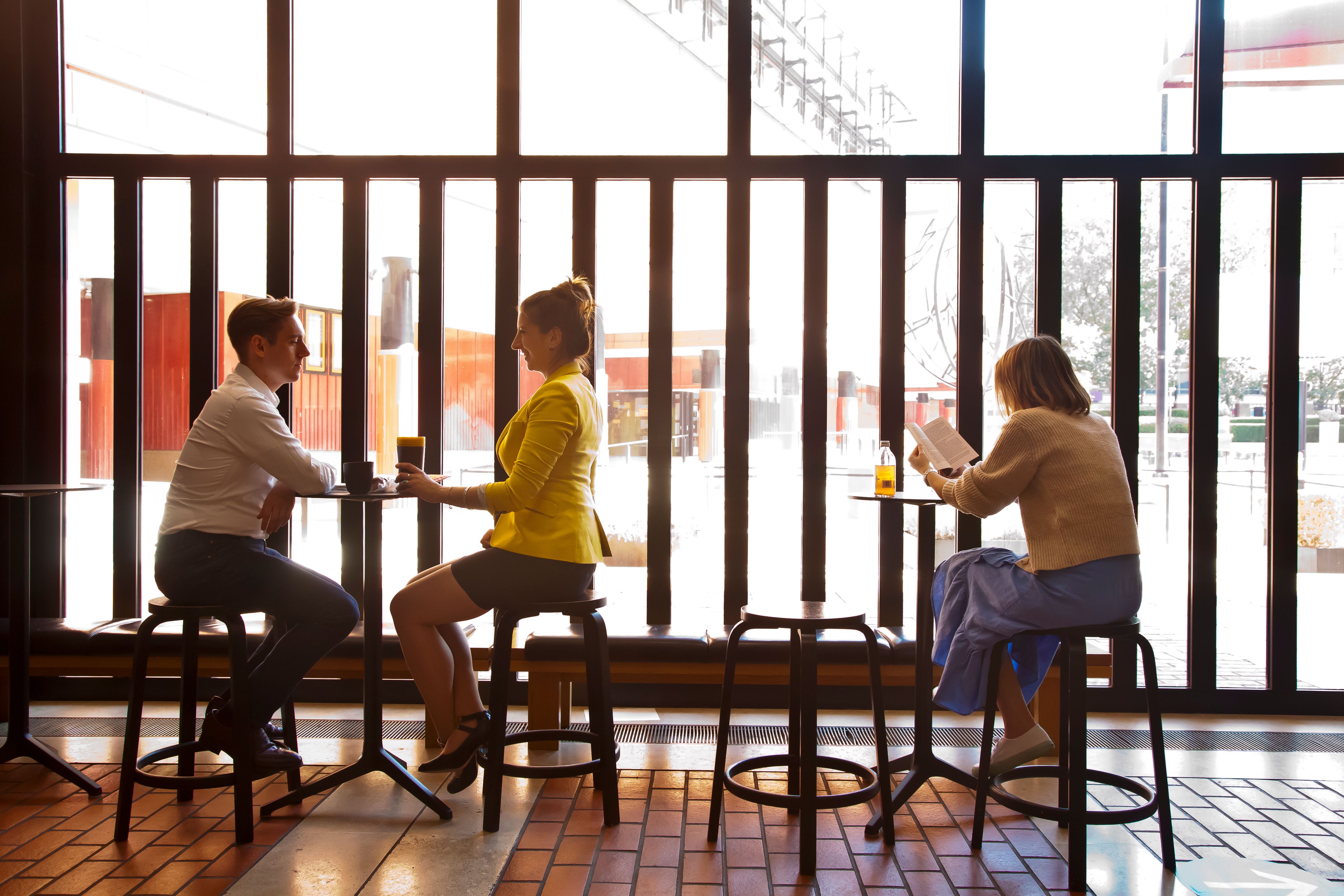 Visitors having a coffee in the Entrance Hall.