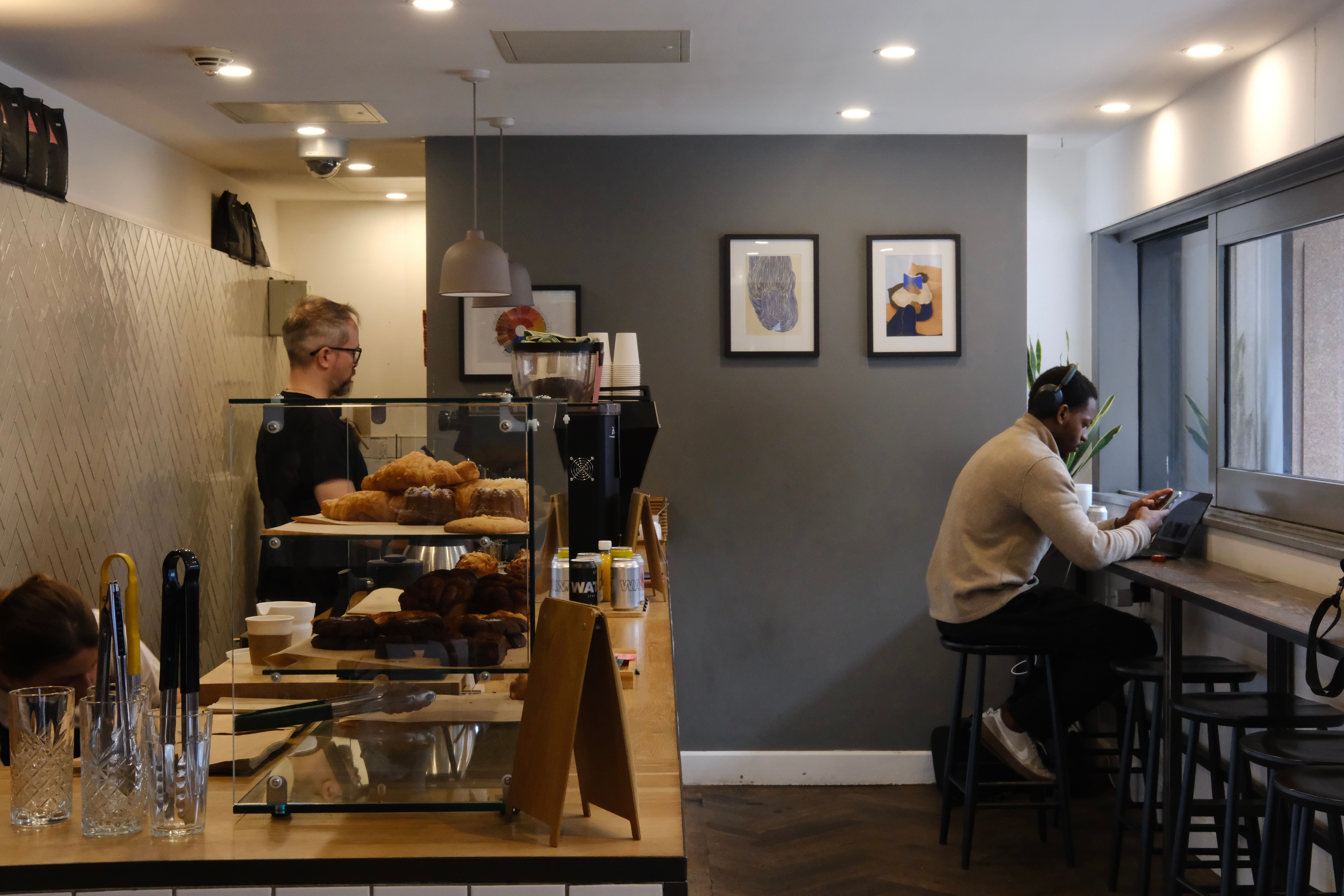 A visitor dining in Origin Coffee.