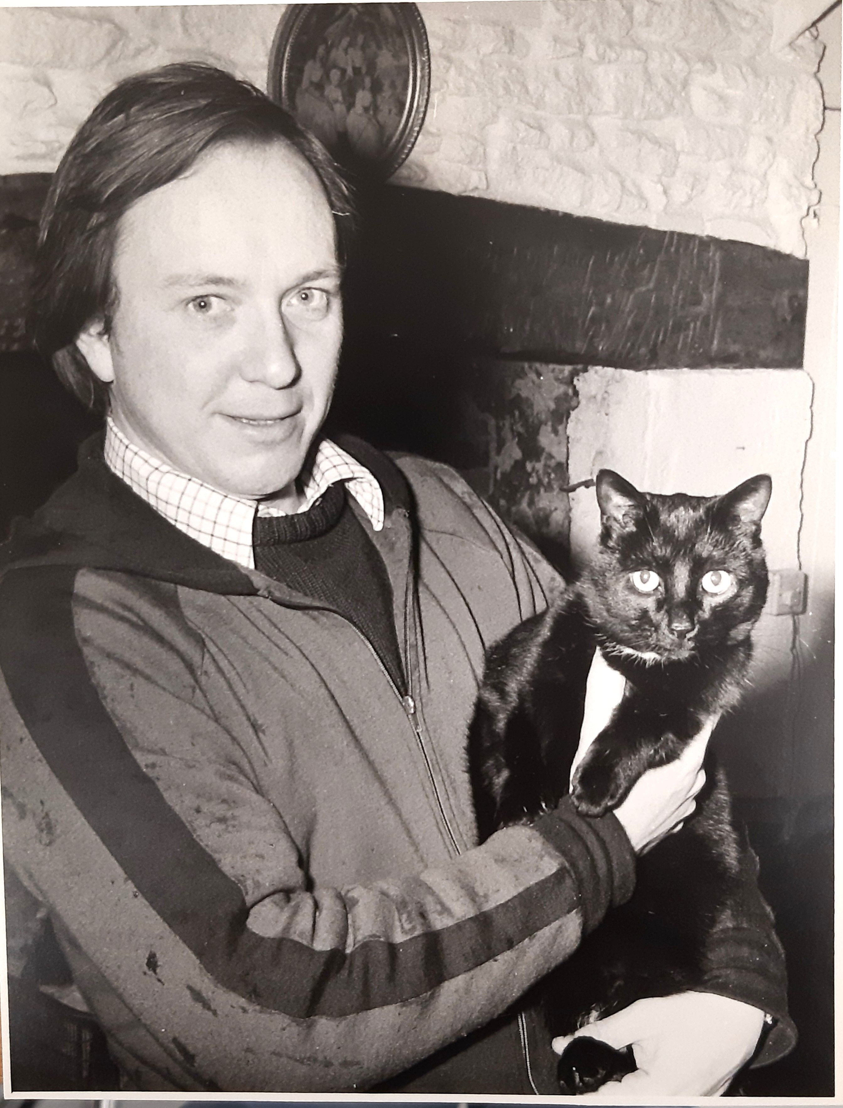 Photograph of Dr Richard D. Ryder with a cat.