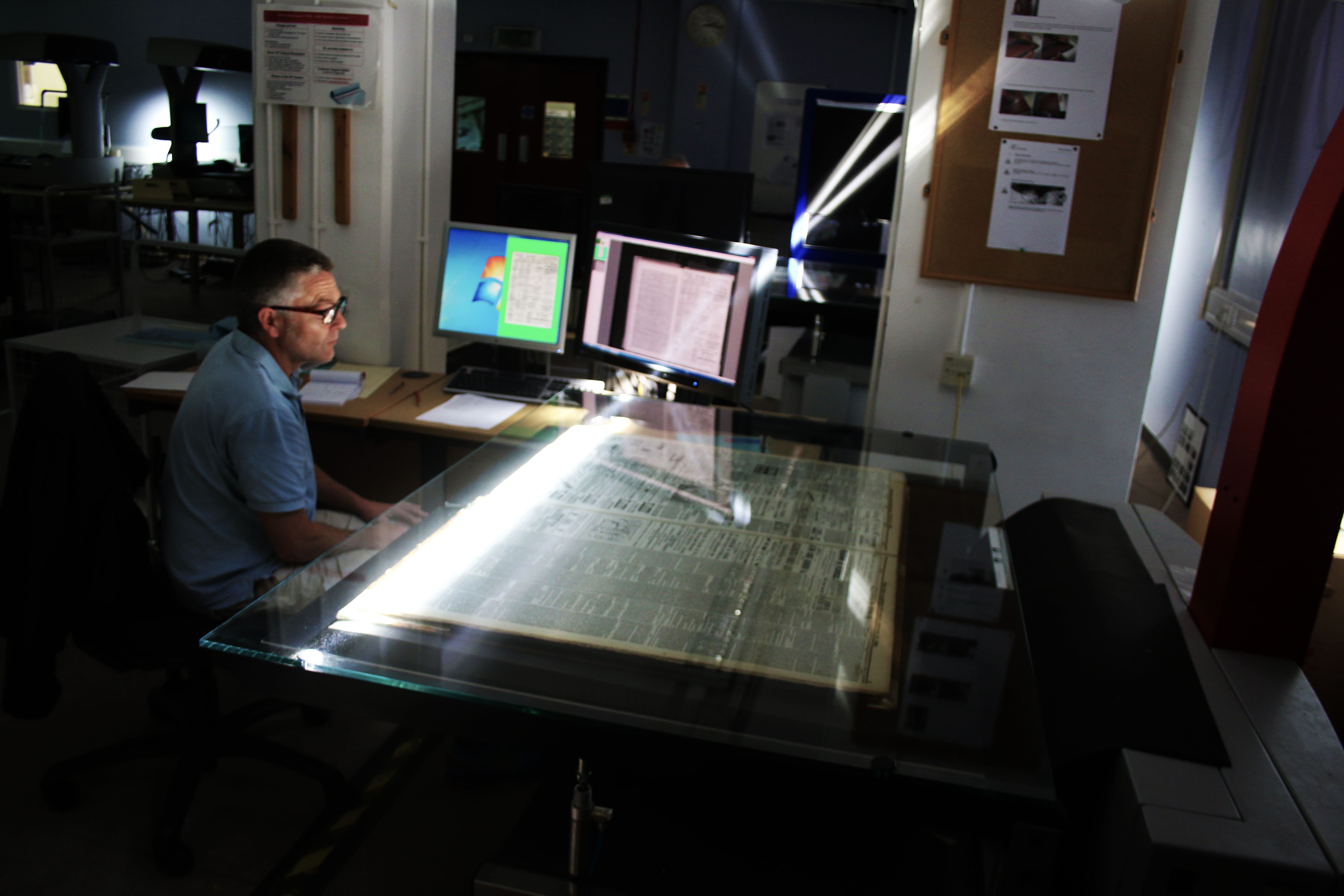 Man operating scanning equipment.