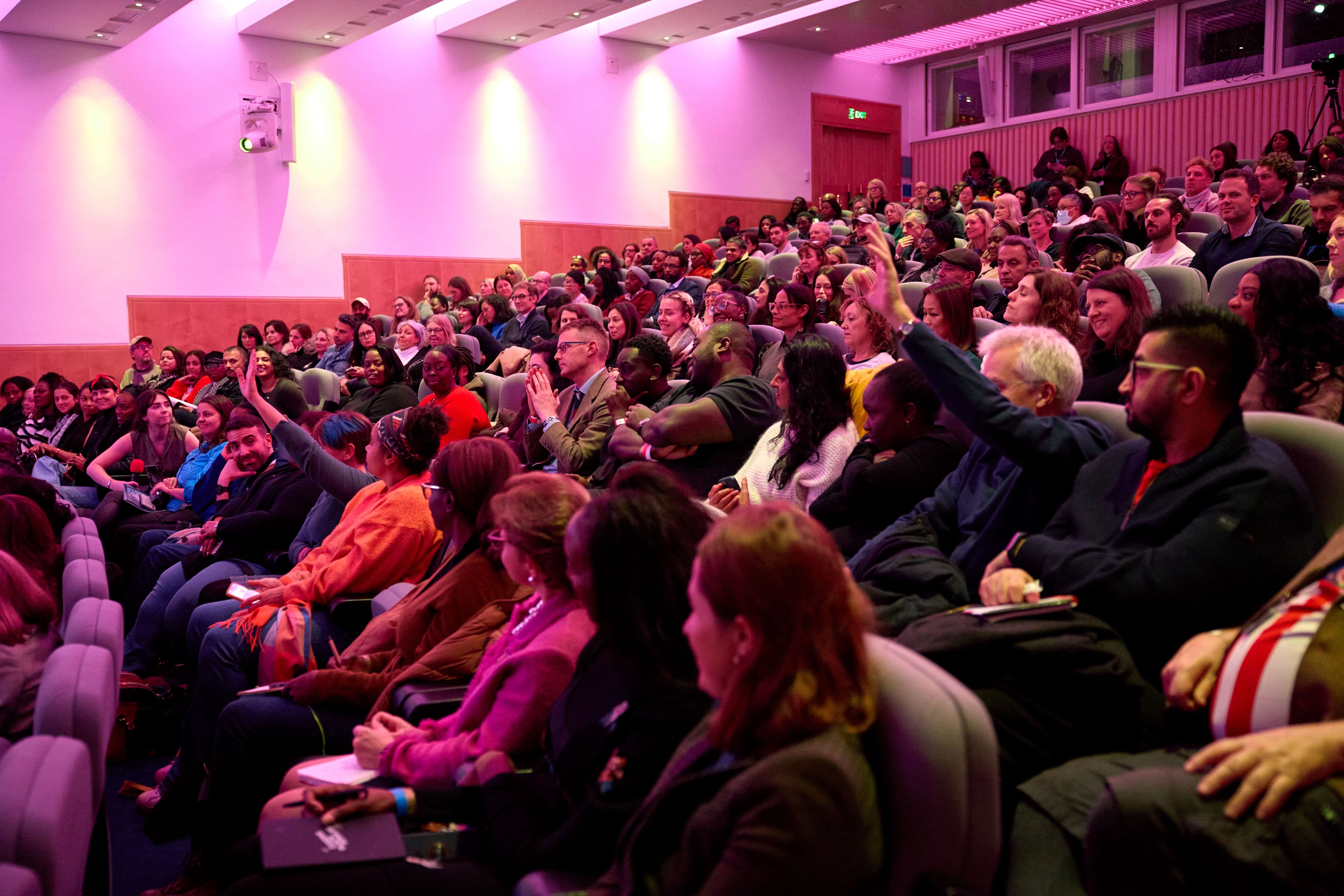 An auditorium full of people at an event at the British Library.