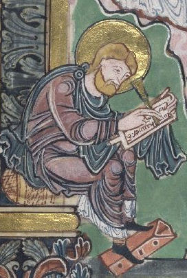 Zachariah writing on a tablet