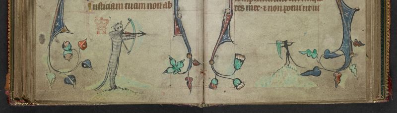 An opening from a Book of Hours, featuring a marginal illustration of a cat with a bow and a mouse lancer taking aim at each other.