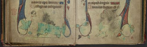 An opening from a Book of Hours, featuring a marginal illustration of the death of the rich man and Lazarus.