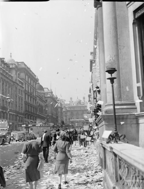 Piles of torn paper thrown from the windows of offices on Lower Regent Street, London, to celebrate the signing of the Peace with Japan