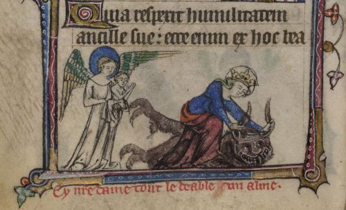 The Virgin Mary, crowned and dressed in blue and red,