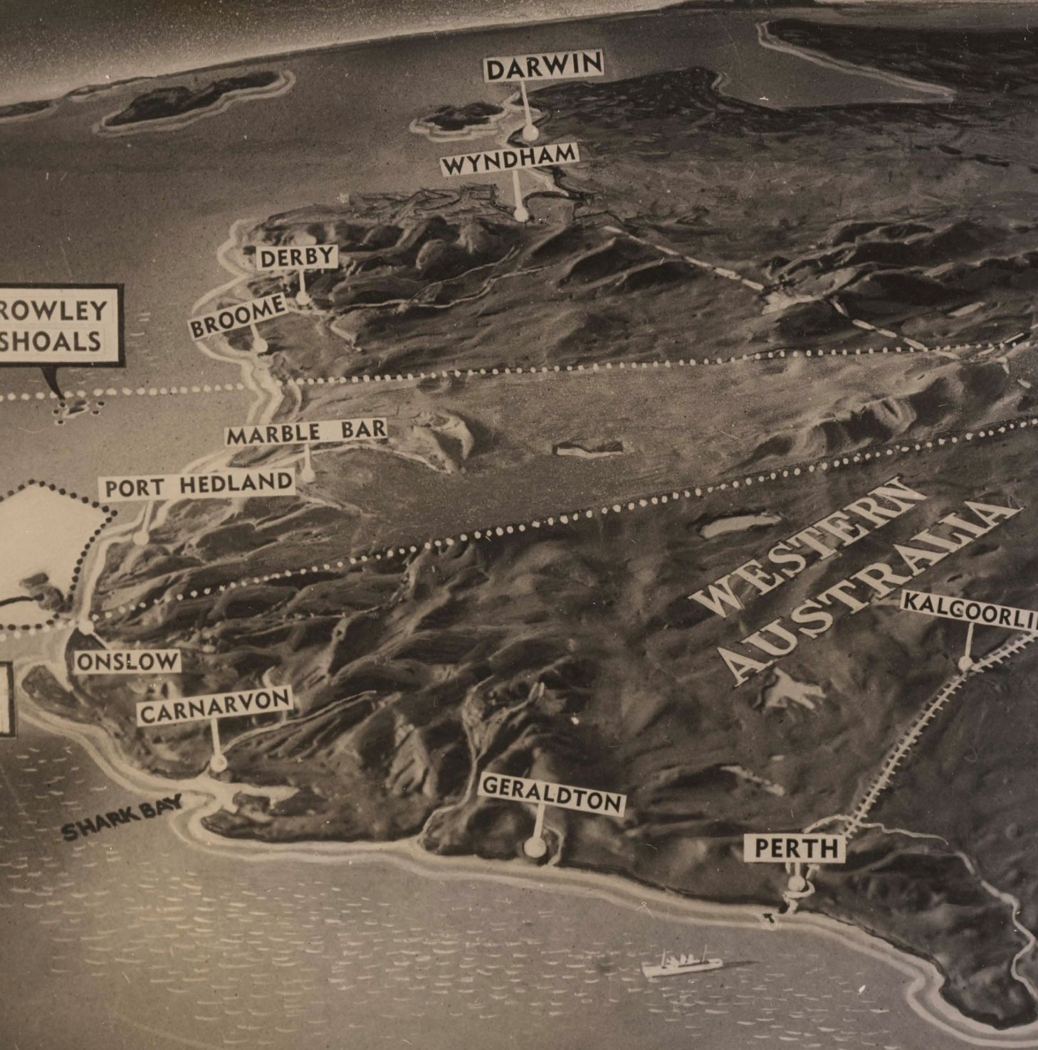 A curving map of the Australian continent, focusing on the space between Woomera in South Australia and the Monte Bello Islands in Western Australia.